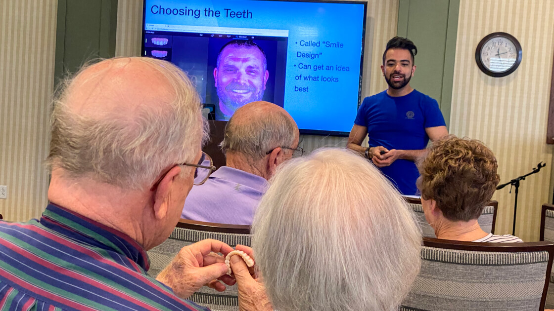 Dr. Peyray discusses dental implants with residents